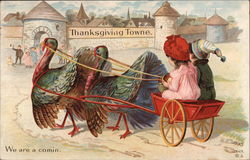 Two Children on a Turkey-Drawn Carriage to Thanksgiving Towne Turkeys Postcard Postcard