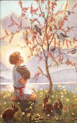 Child holding a rabbit looking at tree covered in birds Postcard