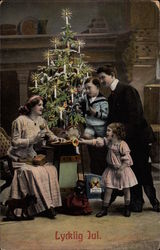 Family in Front of Christmas Tree Postcard Postcard