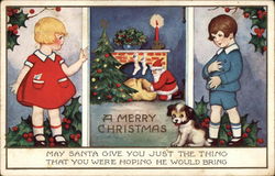 A Merry Christmas - Boy and Girl with Santa Claus at Chimney Children Postcard Postcard