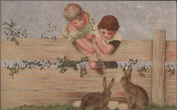 Eastre Greetings - Children with Rabbits Postcard