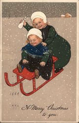 Two Girls on Red Toboggan Children Postcard Postcard