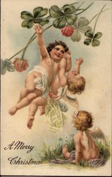 Three Winged Babies with Clover Christmas Postcard Postcard