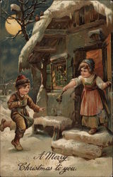 Two Children in Front of Snowy House Postcard