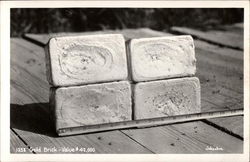 Four Gold Bricks Postcard