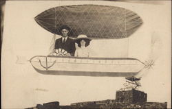 Couple Photographed at Carnival in Mock Blimp Unidentified People Postcard Postcard