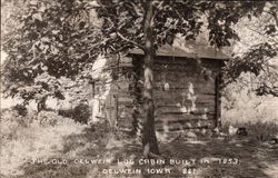 The Old Welwein Log Cabin Oelwein, IA Postcard Postcard