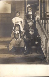 Portrait of Children on Porch Postcard