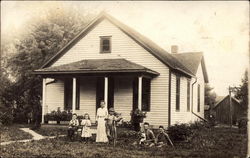 Family In Front Yard Galesburg, IL Postcard Postcard