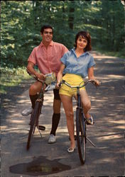 Man and Woman on Bicycles Postcard