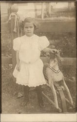 Little Girl with Rocking Horse Postcard