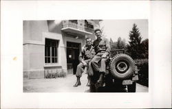 Two Soldiers Sitting on Army Jeep Postcard