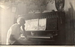 Girl Posing at Piano Postcard