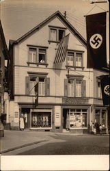 US & Nazi Flags Flying In Front of Shop Bad Deirkheim, Germany Postcard Postcard