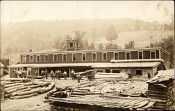 Lumber outside of Depot Logging Postcard Postcard