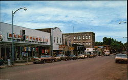 Genesee Street - Downtown Shopping Area Iron River, MI Postcard Postcard