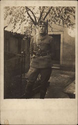 Soldier Posing in Courtyard Postcard