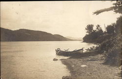 Canoe at edge of water Cooperstown, NY Postcard Postcard