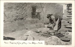 Maria - Preparing to fire pottery Postcard