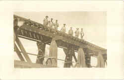 Working men on railroad bridge Postcard