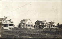 Four homes in a former cow pasture Postcard