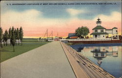 U.S. Government Lighthouse at West End and Seawall Postcard