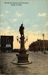 Broadway Squarae and Fountain Fargo, ND Postcard Postcard