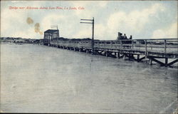 Bridge over Arkansas during June Rise La Junta, CO Postcard Postcard