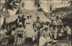 Group of Native Family at their Huts Postcard