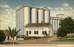 The Birthplace of Post Products in the Shadow of Modern Grain Storage Tanks Postcard