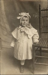 Child Posing with Chair Postcard