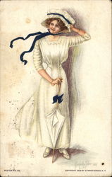 Woman in Long White Dress and Bonnet With Black Bow Postcard