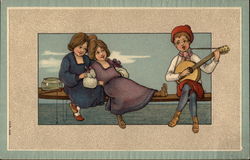 Boy Serenading a Pair of Girls on Dock Postcard