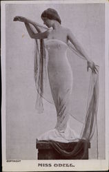 "Miss Odell" standing on a Pedestal Postcard