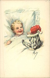 Small Child in Bed Laughing at a Clown Doll Babies Postcard Postcard