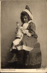 Young Girl sitting on Barrel looking into a Stein Breweriana Postcard Postcard