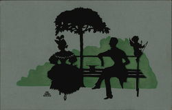 Silhouette of Couple Sitting on Bench with Cupid Silhouettes Postcard Postcard