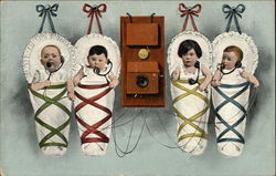 Four Babies Hanging on the Wall by the Telephone Postcard Postcard