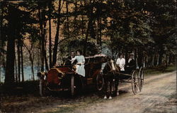 Couple in Automobile beside Couple in Horse & Buggy Postcard