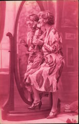 Woman in Patterned Dress Applying Make-up in Mirror Postcard