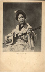 Photograph of Geisha Girl Playing Stringed Instrument Asian Postcard Postcard