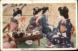 Four Geisha Girls Kneeling with Food & Drink Asian Postcard Postcard