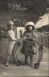 "Good Luck in the New Year" - with Children in the Snow Postcard