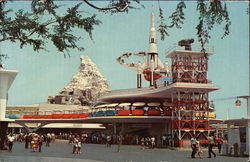 Disneyland - Tomorrowland view of the Matterhorn Postcard