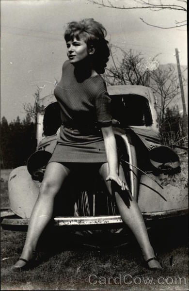 Woman Posing with Old Car Women