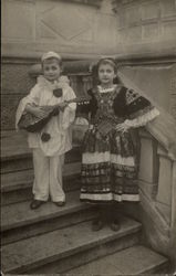 2 Children in Costume for playing Music and Dancing Postcard