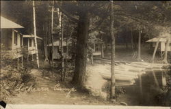 Cottages in a Forest by a Lake Camping Postcard Postcard