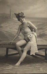 Woman in Swimwear on a Bench at the Ocean Swimsuits & Pinup Postcard Postcard