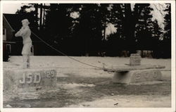 Ice Sculputre of Man Pulling Log Raft Carrying Barrell Postcard