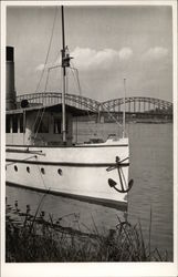 Sailing Vessel on the Water with Bridge in the Background Postcard